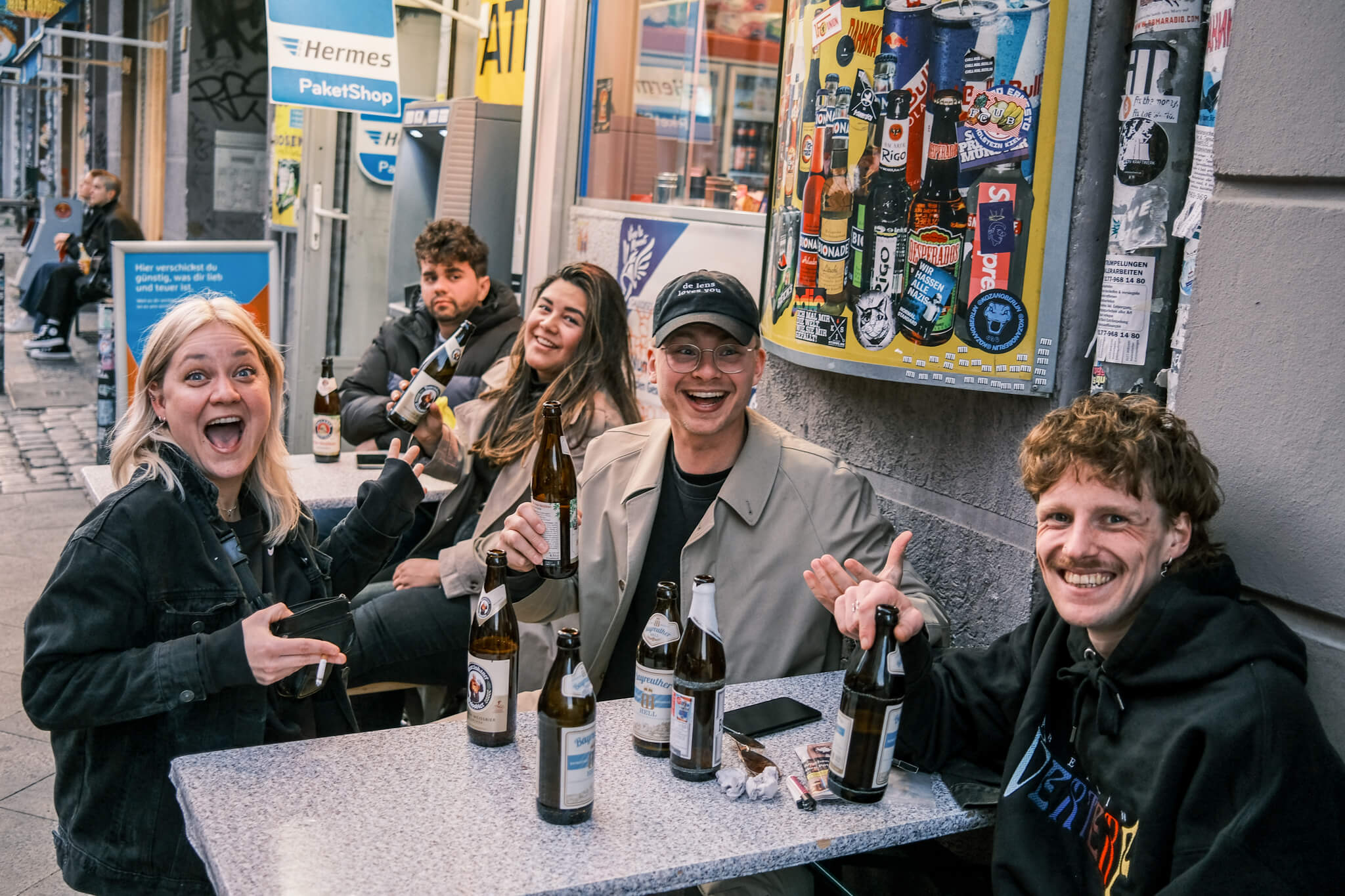 a group of friends at a Späti in Berlin, Germany