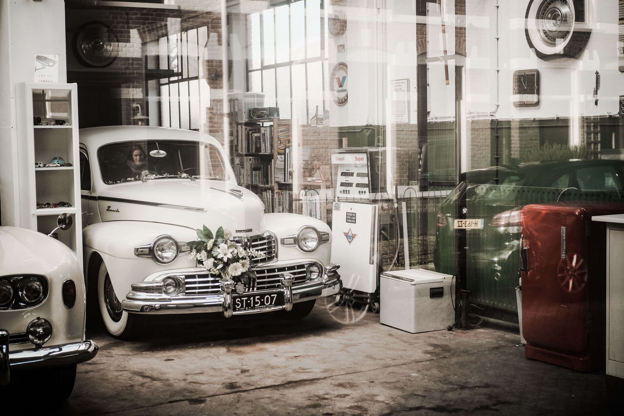 a vintage automobile inside a garage