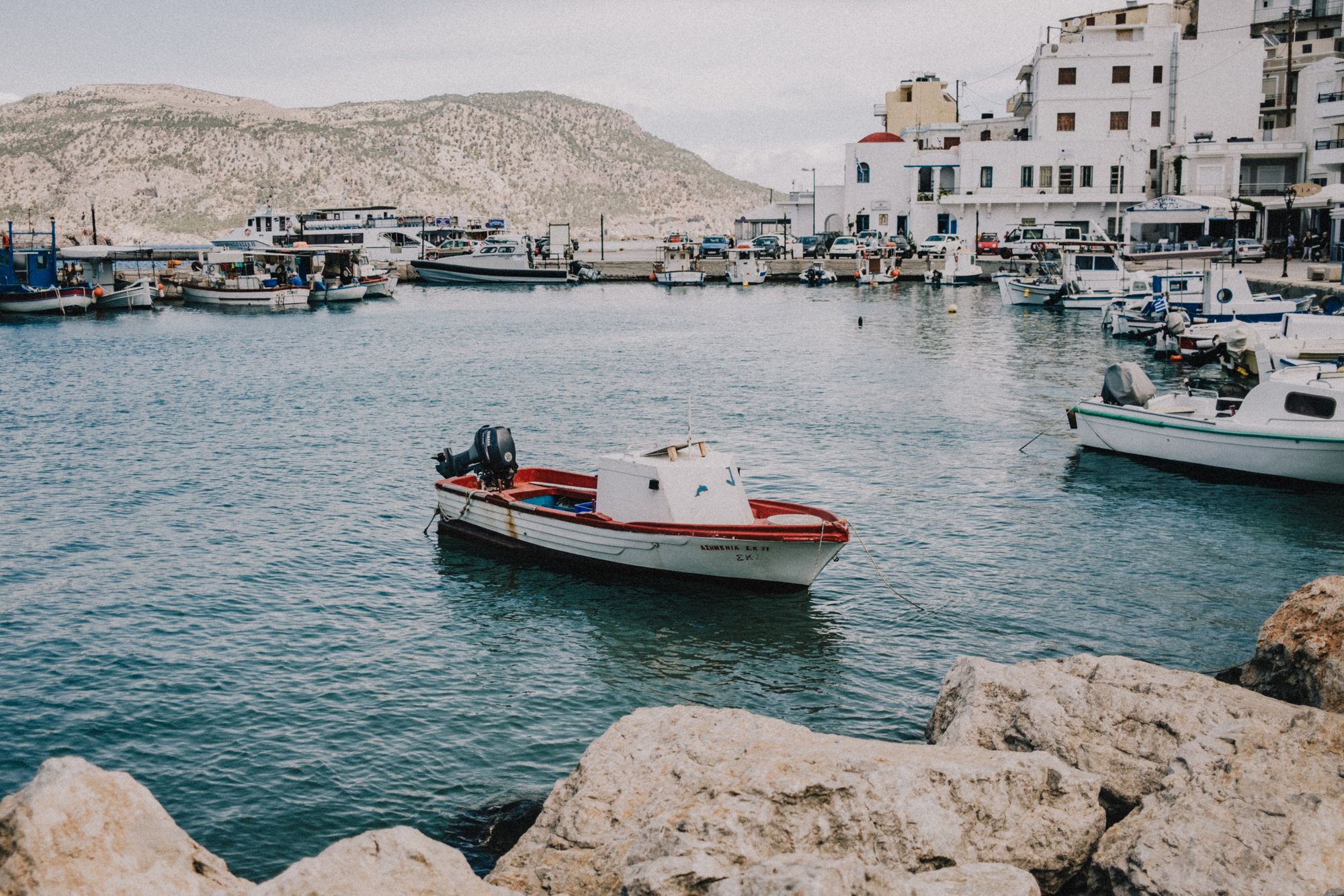A small boat in the harbor in Pigadia (Karpathos City)